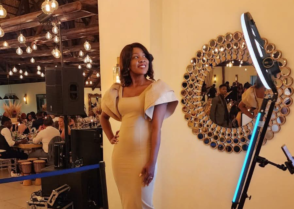 Guest enjoying a 360 degree video booth experience at a private celebration