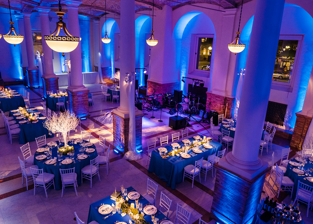 Wedding venue transformed with elegant uplighting and ambient lighting design