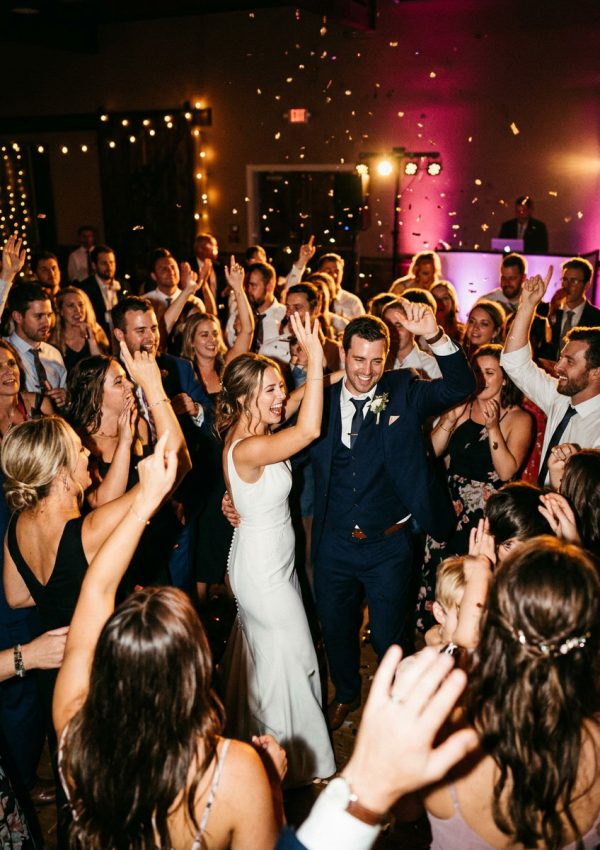 Wedding guests celebrating on the dance floor with professional DJ entertainment in Johannesburg